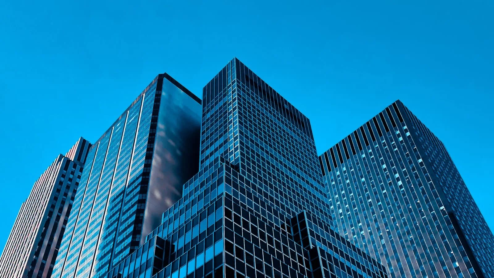 Modern corporate skyline representing industries Callidora serves